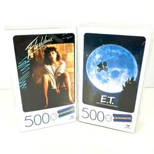 2 Pack Flashdance, and ET 500-Piece Puzzles in Plastic Retro Blockbuster VHS New